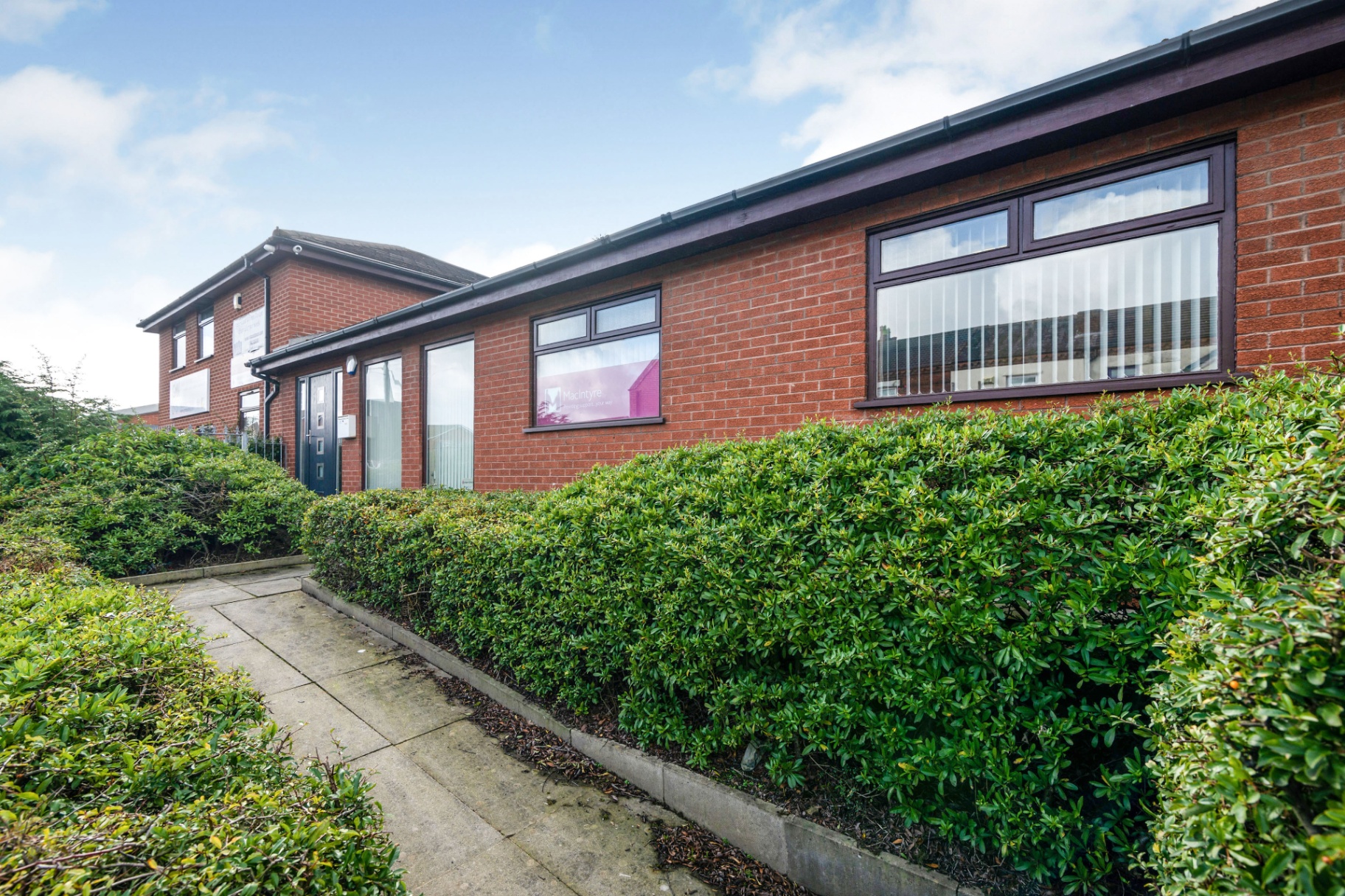 Lesscent House office building exterior in Ashton-in-Makerfield, Wigan